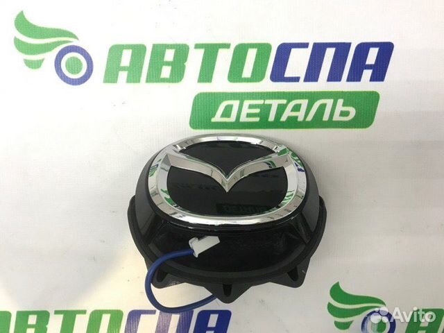 Эмблема крышки багажника Mazda 3Bp хетчбек 5D