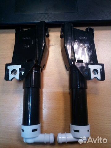 Форсунка омывателя фар Mitsubishi Pajero 4