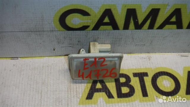 Фонарь подсветки номера Toyota Corolla (E120) 200