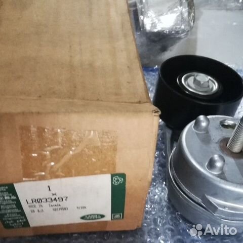 Ролик натяжитель ремня в сборе 2,2 2,4 TD4