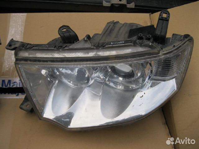 Фара передняя левая Mitsubishi Pajero Sport 2 KH4W Фара передняя левая Mitsubishi Pajero Sport 2 KH4W