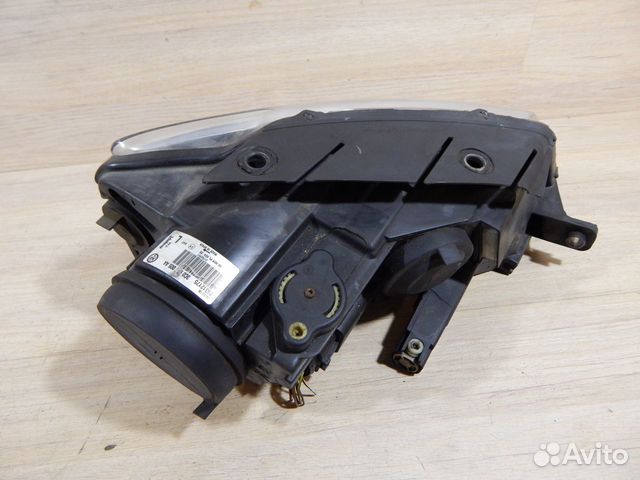 Фара передняя левая Vw Passat B6