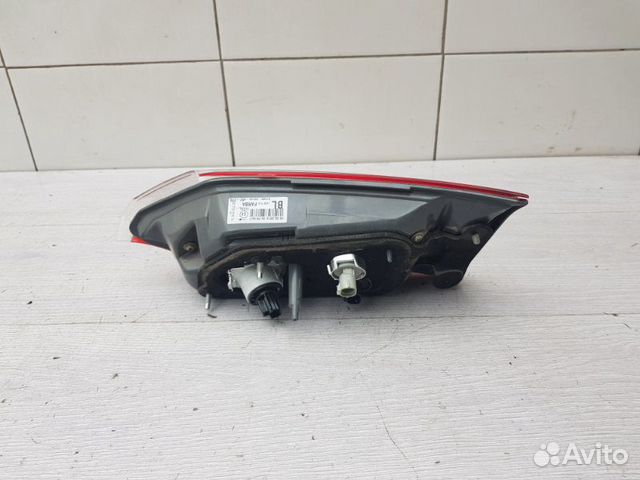 Фонарь в крышку левый Toyota Corolla E180 1ZR-FE