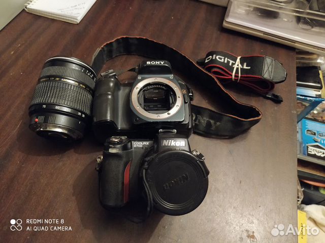 Зерк фотоаппарат Sony Dslr-A100 и Nicon E8700