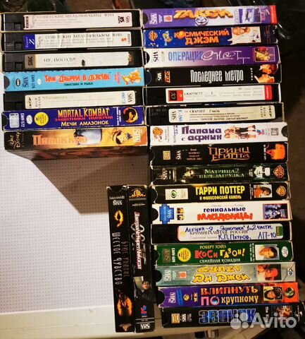 Видеокассеты с фильмами и мультиками