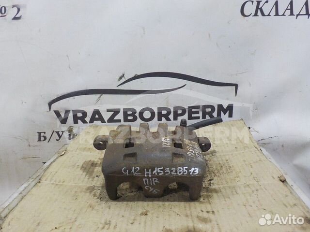 Суппорт тормозной передний правый Subaru Legacy