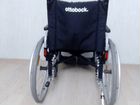 Инвалидная коляска с антиопрокидывателем