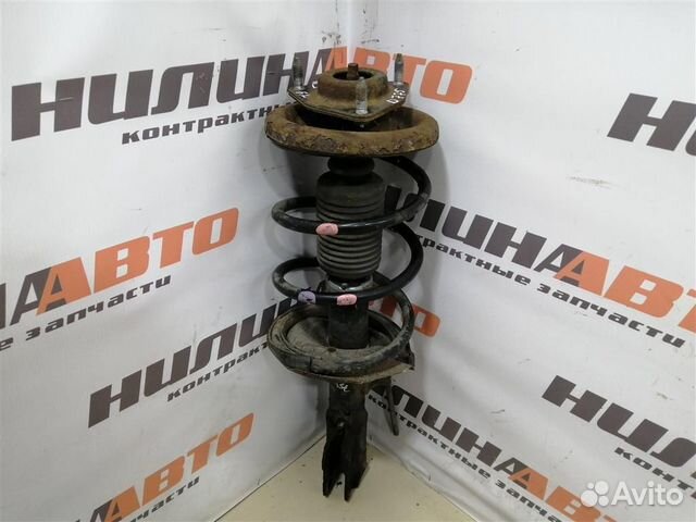 Амортизатор передний левый Митсубиси Лансер 10