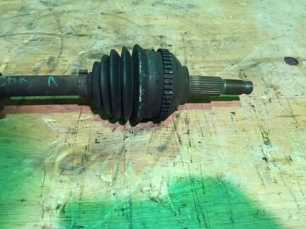 Приводной вал передний левый Chrysler Voyager 4